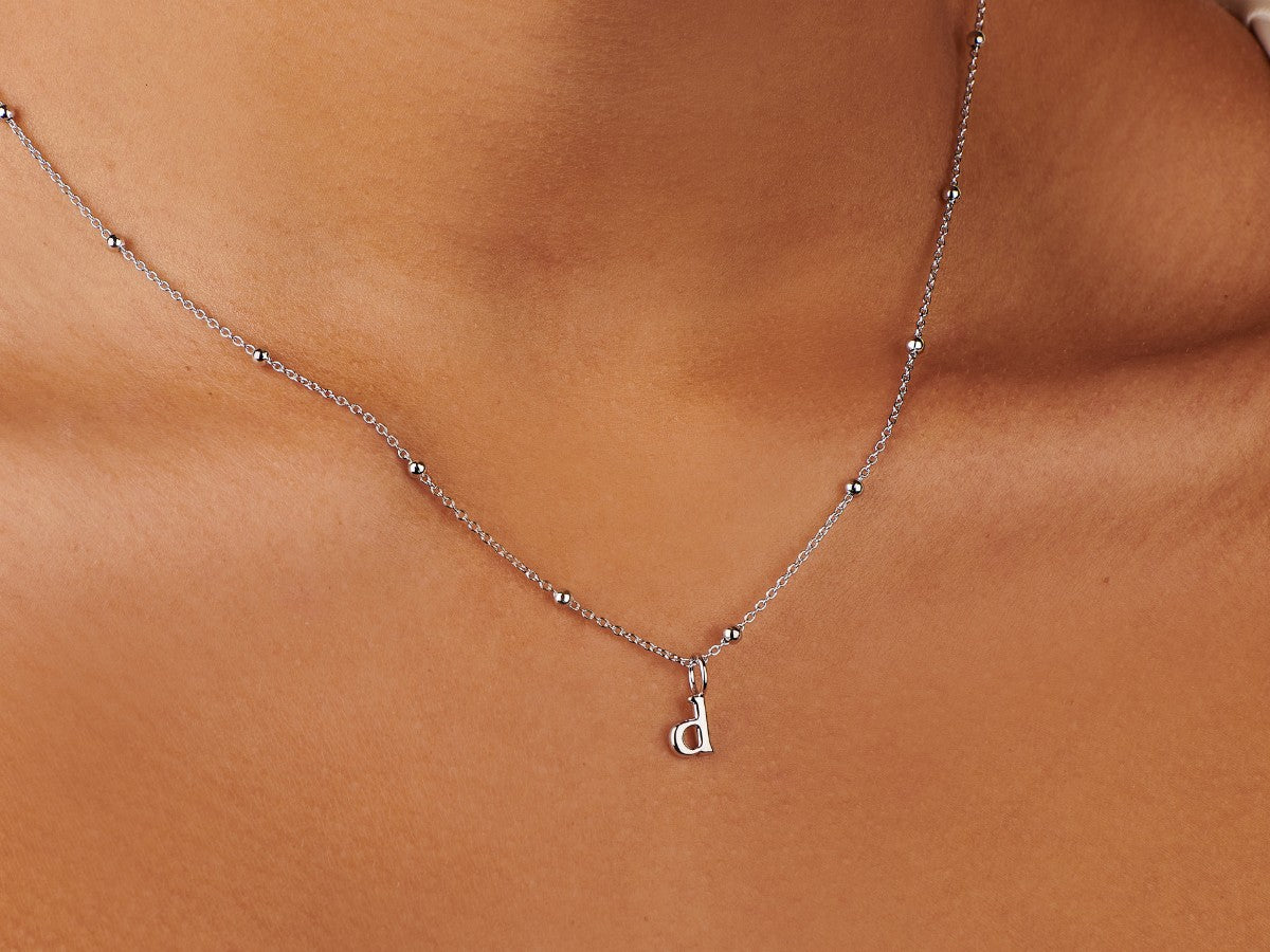 Tiny Lowercase Initial Sterling Silver Necklace | Little Sky Stone