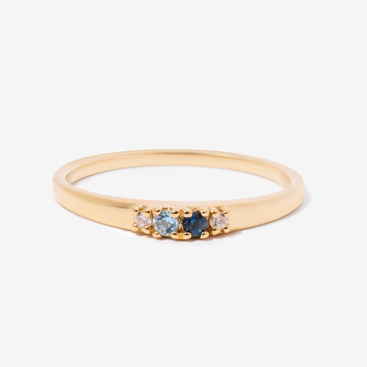 Graduated 4 Stone Blue London Swiss Clear Topaz Ring Varena
