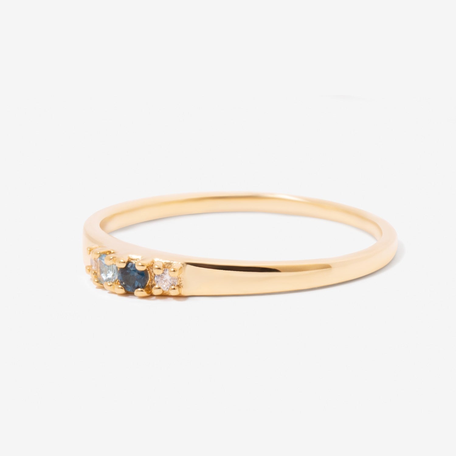 Graduated 4 Stone Blue London Swiss Clear Topaz Ring Varena