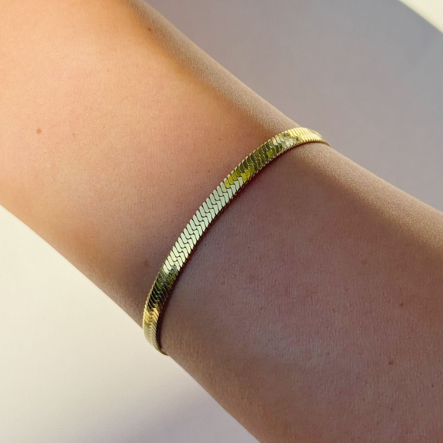 Herringbone Chain Bracelet in 14k gold over stainless steel