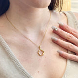 Twisted Infinity Circle Charm Necklace